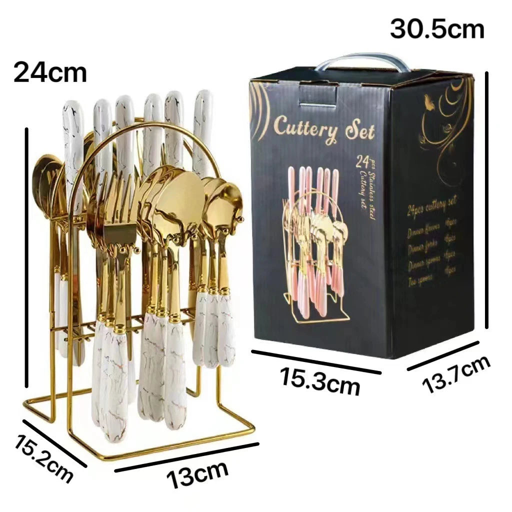 MC THE BLACK DIAMOND stainless steel flatware set with knives, forks, and spoons displayed on a clean table setting.
