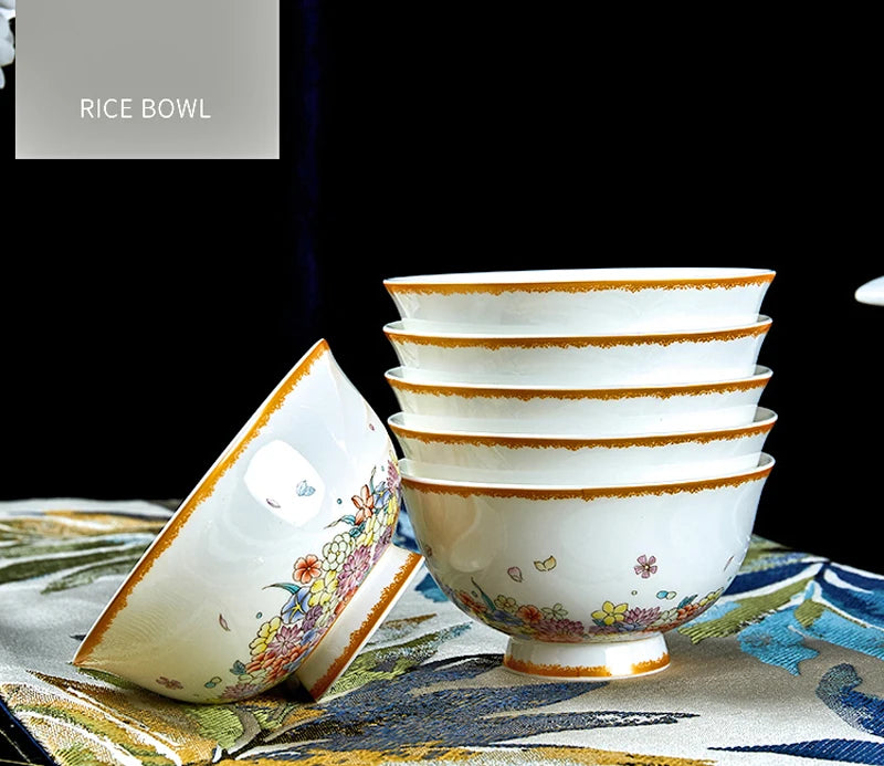 Family size MC THE BLACK DIAMOND dinnerware set with star design, including plates, bowls, and cups arranged on a table.