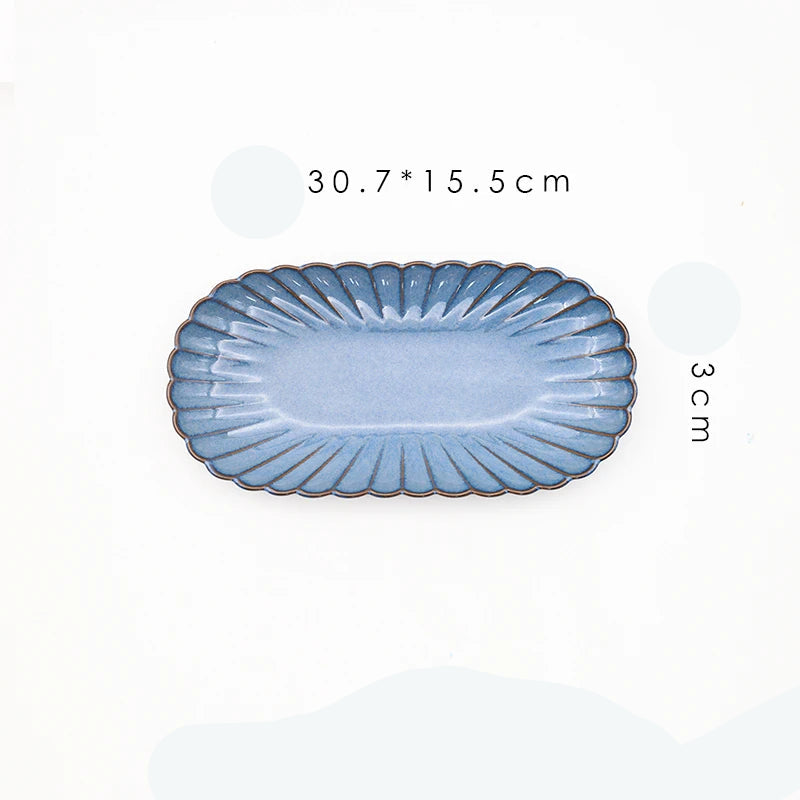 MC THE BLACK DIAMOND dinnerware set with variable glaze, featuring Western-style ceramic plates and bowls on a table.