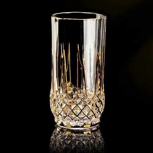 Elegant glass red crystal cup with gold accents from MC THE BLACK DIAMOND, part of a stylish drinkware set.