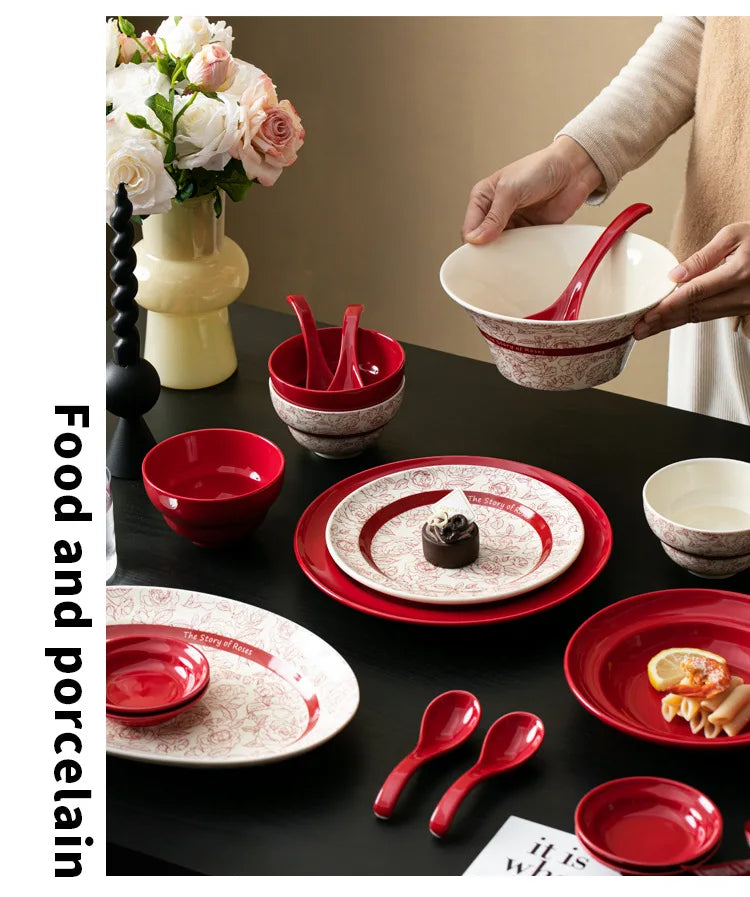 Red retro ceramic dinnerware set by MC THE BLACK DIAMOND featuring luxurious porcelain plates and bowls arranged on a table.