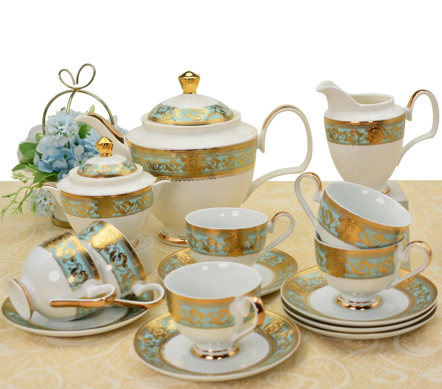 Embossed gold porcelain dinnerware set by MC THE BLACK DIAMOND with elegant embossed patterns and luxurious gold accents.