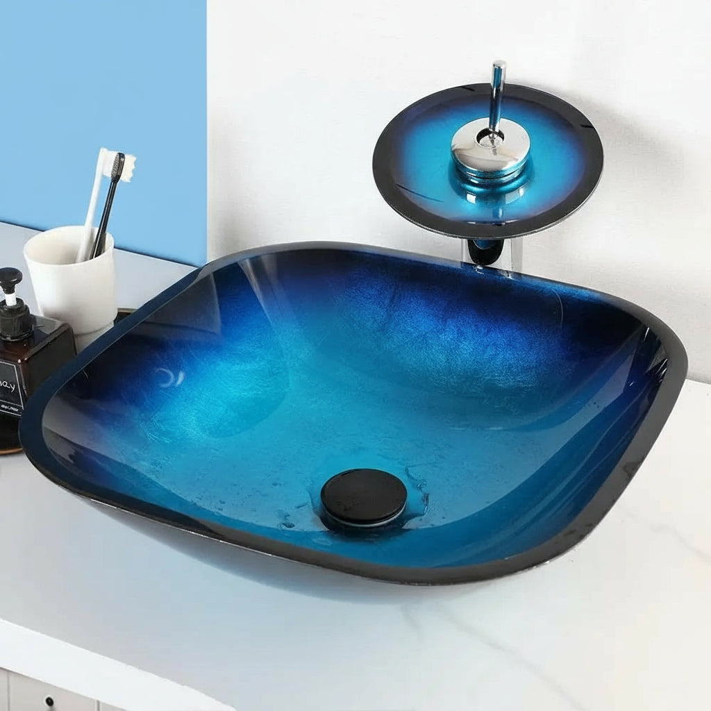Blue glass vessel sink and waterfall faucet set by MC THE BLACK DIAMOND, modern bathroom fixture with sleek design and vibrant color.