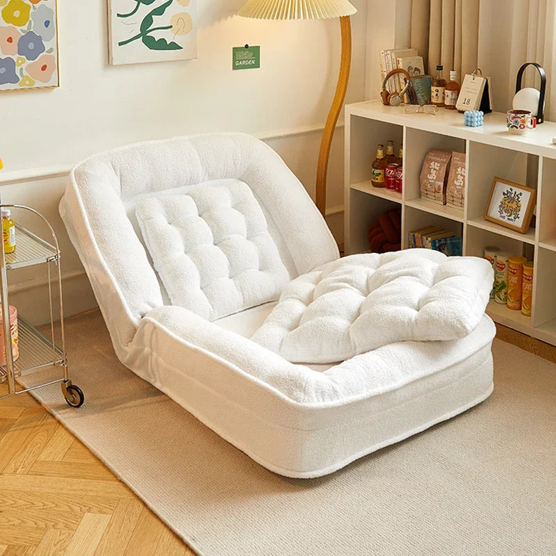 MC THE BLACK DIAMOND reclining single sofa bed, foldable tatami small sofa for sleeping and lounging in a bedroom setting.