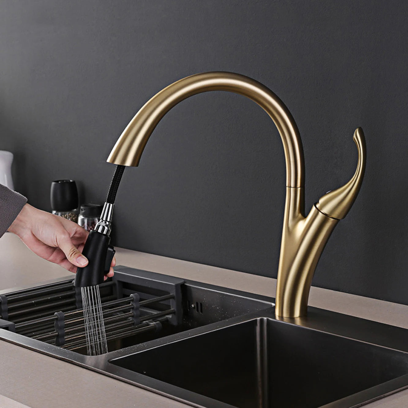 MC THE BLACK DIAMOND dual-spray pull-out kitchen faucet with chrome finish, featuring a sleek design and flexible spray head.