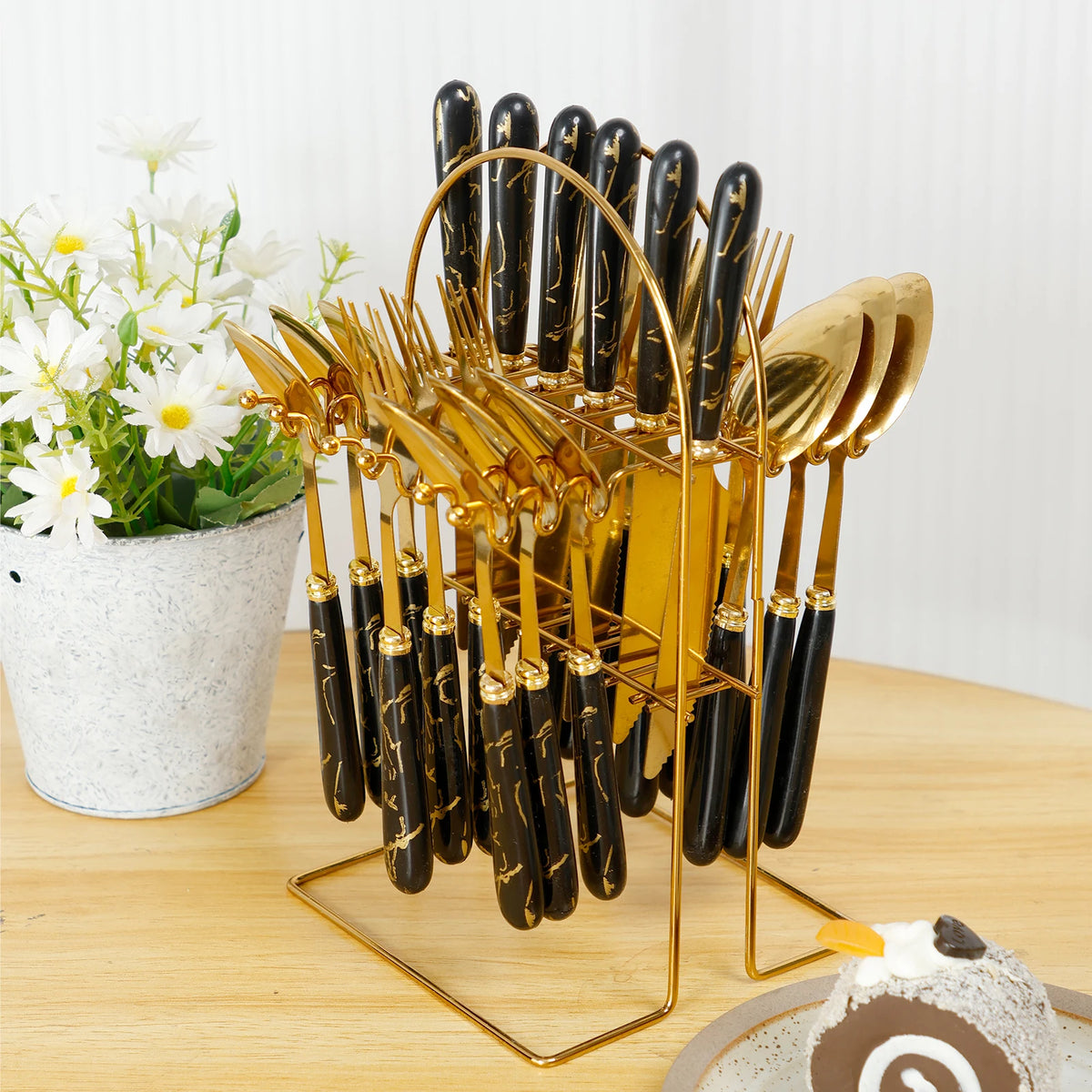 Stainless steel flatware set with holder by MC THE BLACK DIAMOND, includes forks, knives, and spoons arranged in a sleek organizer.