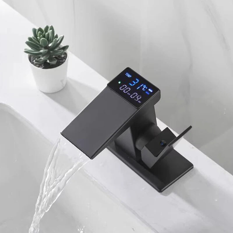 LED washbasin waterfall tap by MC THE BLACK DIAMOND, bathroom deck-mounted sink faucet with modern waterfall flow feature.