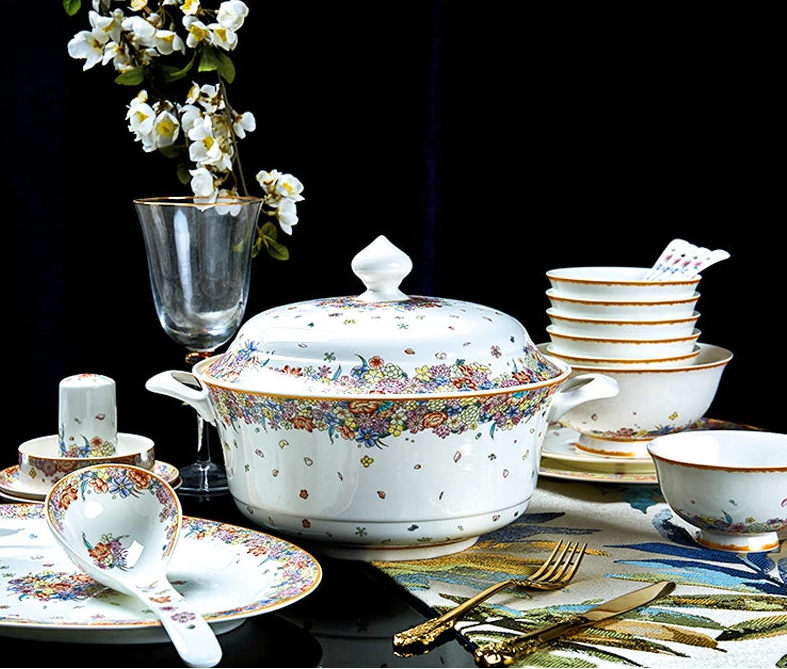 Family size dinnerware set with star design by MC The Black Diamond, includes plates, bowls, and cups for serving meals.