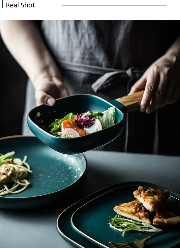 Dark green ceramic Western dinnerware set by MC THE BLACK DIAMOND, featuring plates, bowls, and serving pieces on a neutral background.
