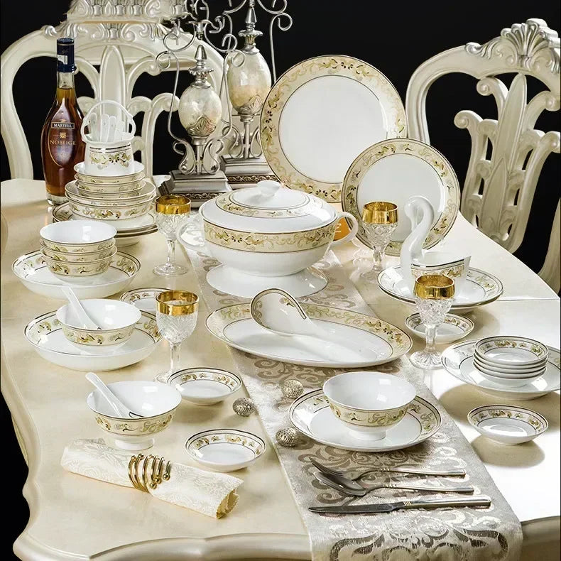 Golden ceramic dinnerware set by MC THE BLACK DIAMOND, elegant luxury tableware with matching plates and bowls arranged on a dining table.