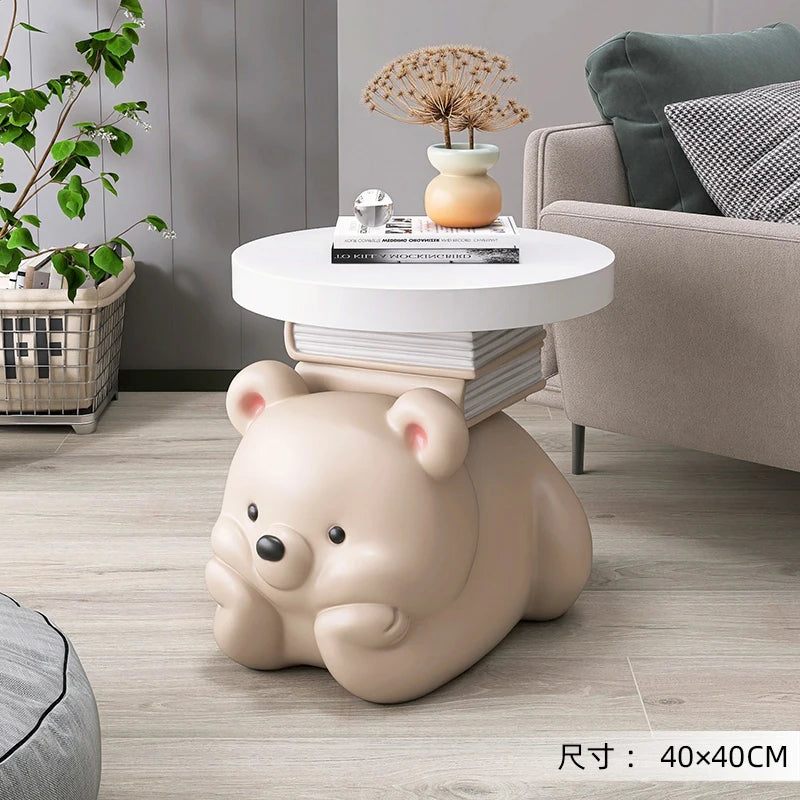 Cream bear-shaped MC THE BLACK DIAMOND end table used as a living room floor ornament and home accessory with a cute design.