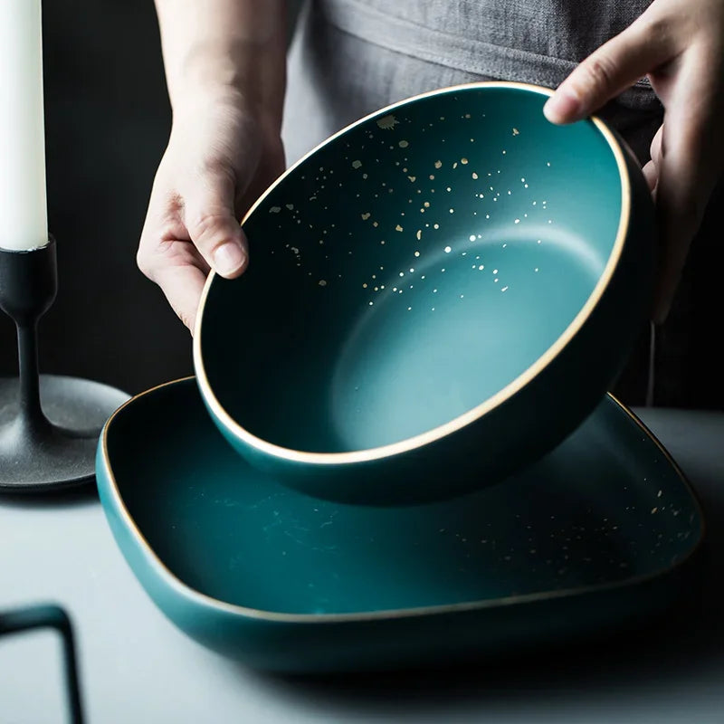 Dark green ceramic Western dinnerware set by MC THE BLACK DIAMOND, includes plates and bowls with a sleek Nordic design.