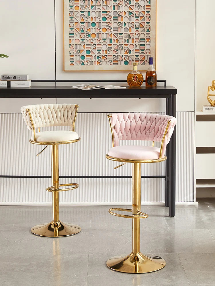 Adjustable MC THE BLACK DIAMOND Nordic high foot stool chair with sleek modern design and wooden legs.
