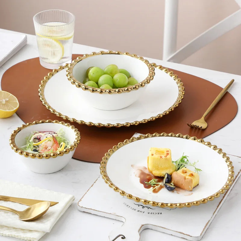 Nordic ceramic plates and bowls set with gold round dot edge, includes steak plates, salad and dessert bowls for elegant dinnerware.