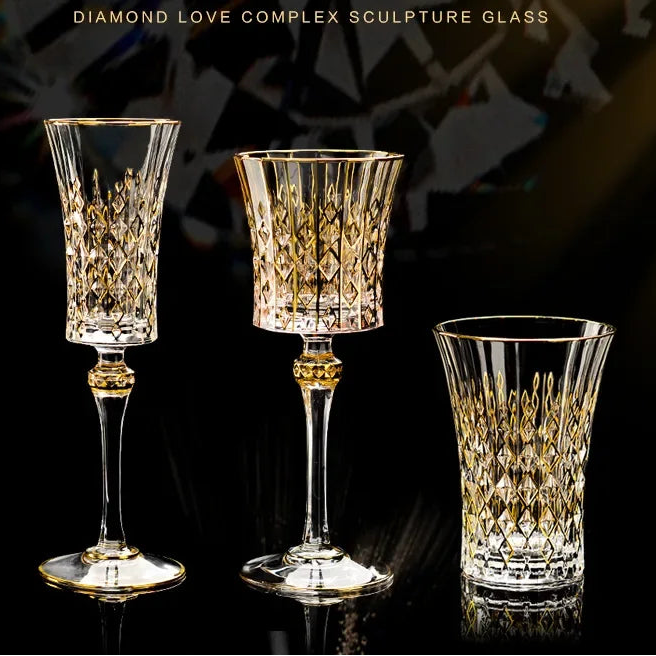 Gold crystal glass red cup from MC THE BLACK DIAMOND Drinkware Set, showcasing a elegant, transparent glass with a red tint.