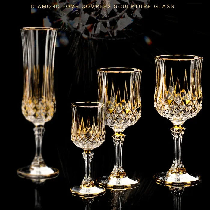 Elegant glass red crystal cup with gold accents from MC THE BLACK DIAMOND drinkware set, showcasing a luxurious, transparent design.
