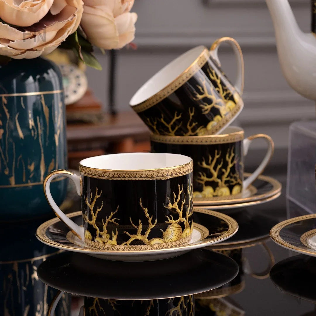 Elegant MC THE BLACK DIAMOND Royal Design dinnerware set with plates, bowls, and cups arranged on a table.