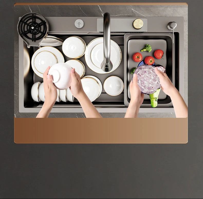 Kitchen sink waterfall faucet by MC THE BLACK DIAMOND with large single bowl and cup washer feature in a modern kitchen.