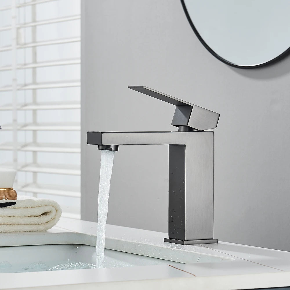 Matte black stainless steel bathroom sink faucet with hot and cold mixer from MC THE BLACK DIAMOND, modern bathroom fixture.