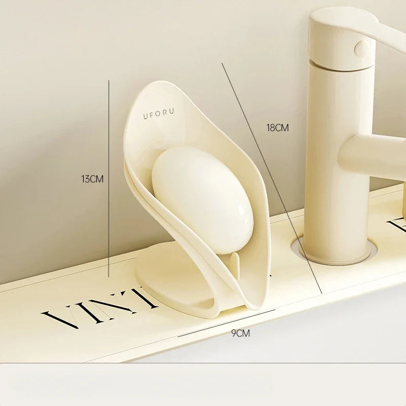 MC THE BLACK DIAMOND multi-functional countertop soap dish holder with self-draining design, made of durable material.
