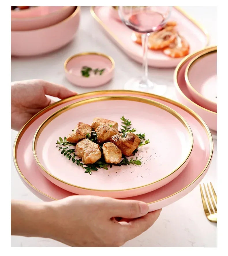 Ceramic kitchen dinnerware set by MC THE BLACK DIAMOND, includes plates, bowls, and cups arranged on a table.