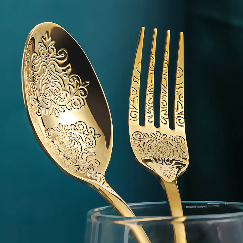 Stainless steel gold flatware set with silverware and cutlery kit from MC THE BLACK DIAMOND, featuring forks, knives, and spoons.
