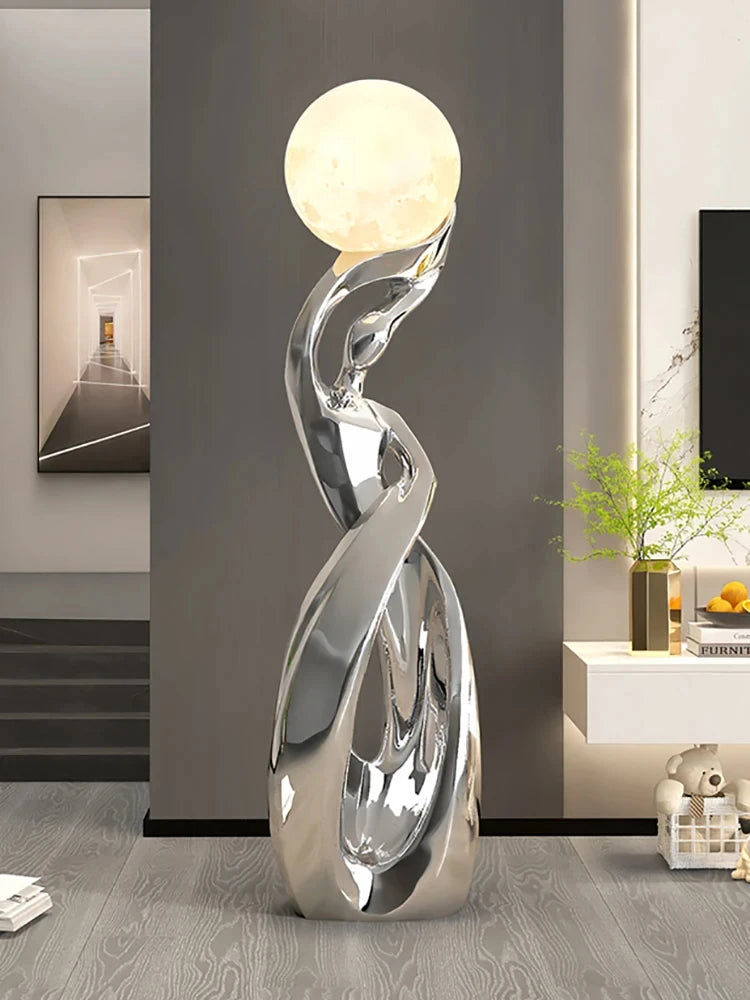 Large luminous living room sculpture by MC THE BLACK DIAMOND, modern sculpture and statue with glowing design for interior decor.