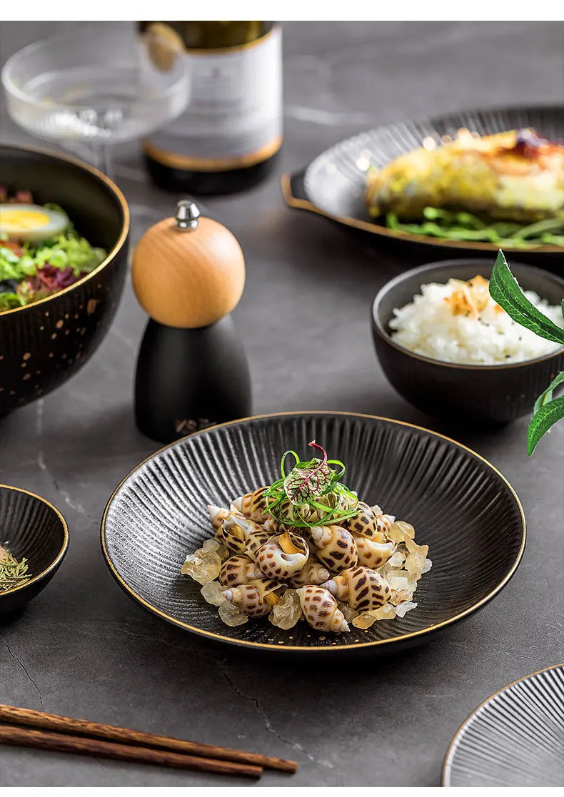 Ceramic kitchen dinnerware set with bowls and cutlery from MC THE BLACK DIAMOND, arranged on a table for serving meals.