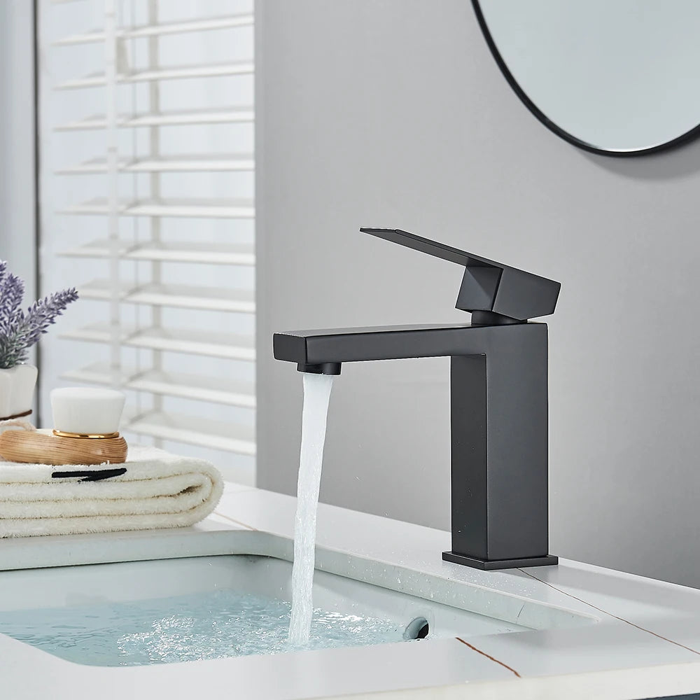 Matte black stainless steel bathroom sink faucet with hot and cold mixer, modern design from MC THE BLACK DIAMOND