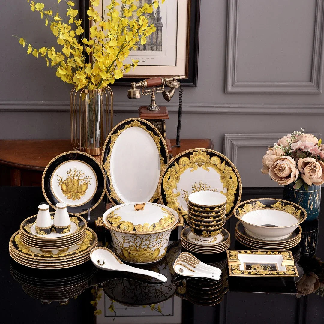Elegant MC THE BLACK DIAMOND Royal Design dinnerware set with matching plates and bowls arranged on a table.