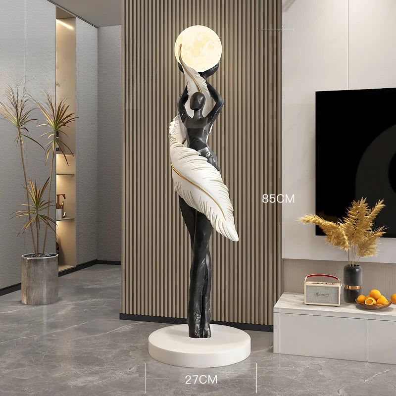 Large modern resin sculpture of a feathered girl by 𝕄𝕔 𝕋𝕙𝕖 𝔹𝕝𝕒𝕔𝕜 𝔻𝕚𝕒𝕞𝕠�