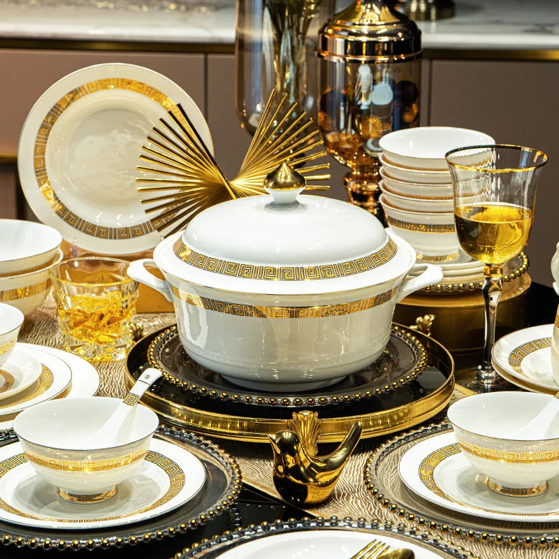Elegant MC THE BLACK DIAMOND dinnerware set with white plates and bowls, perfect for hosting guests in style.
