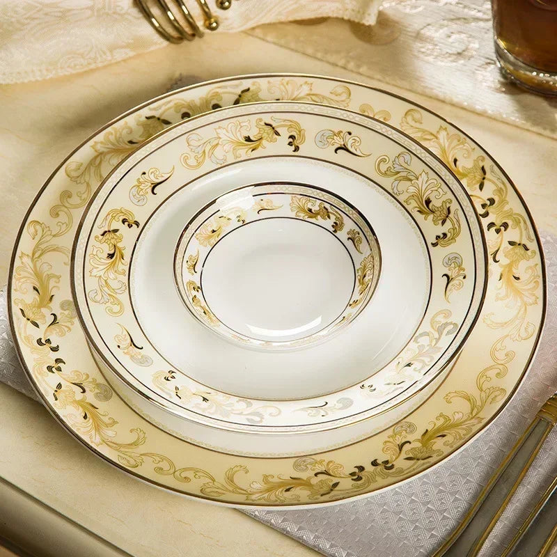 Golden ceramic dinnerware set by MC THE BLACK DIAMOND featuring elegant plates and bowls for luxurious table setting.