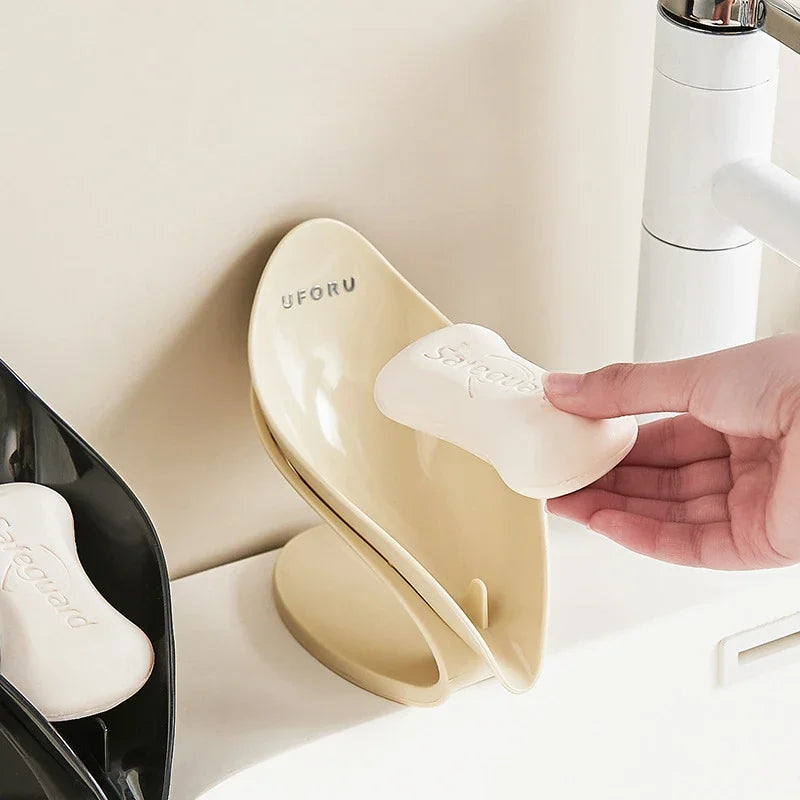 MC THE BLACK DIAMOND multi-functional soap dish holder with self-draining design for countertop storage.