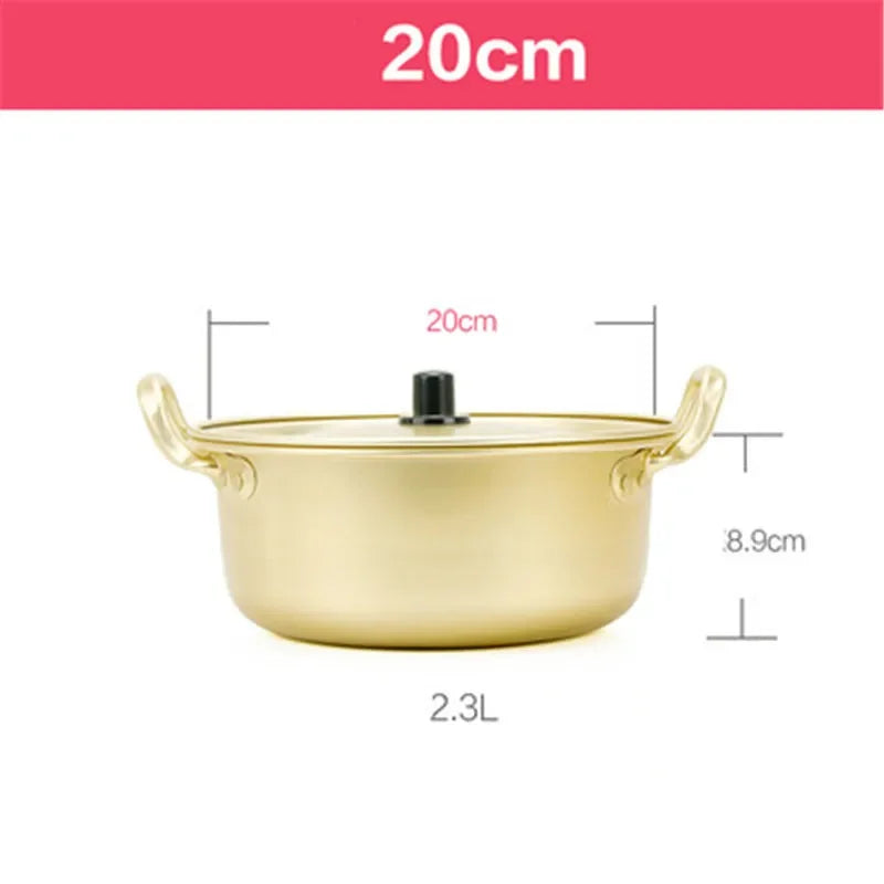 Gold aluminum stock pot from MC THE BLACK DIAMOND, ideal for cooking in the kitchen with durable, shiny aluminum cookware.