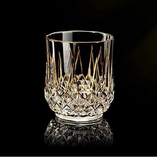 Elegant glass red cup with gold crystal accents from MC THE BLACK DIAMOND Drinkware Sets, showcasing a stylish and luxurious design.