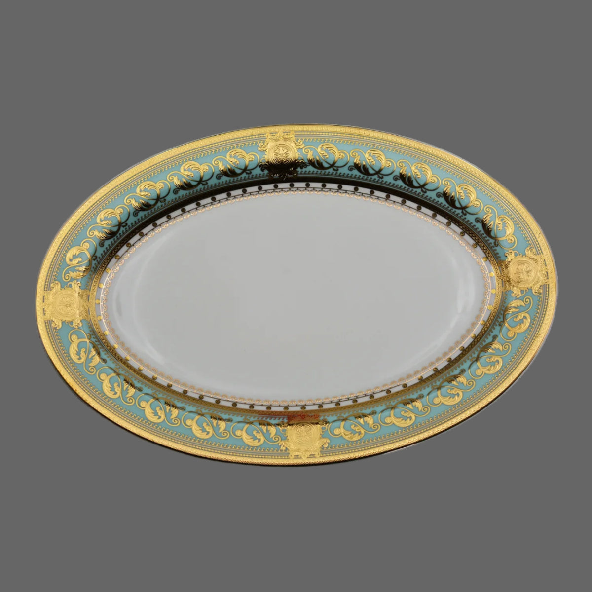 Embossed gold porcelain dinnerware set by MC THE BLACK DIAMOND with elegant embossed designs and luxurious finish.