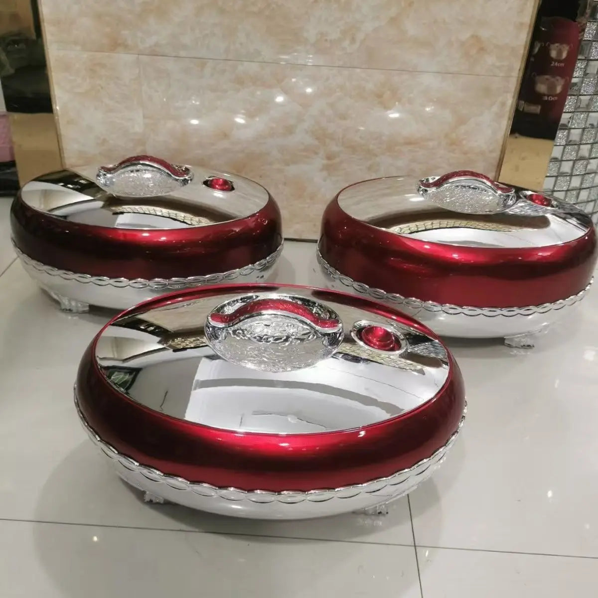 Large MC THE BLACK DIAMOND stainless steel hot pot set for parties, featuring a food warmer with multiple compartments.