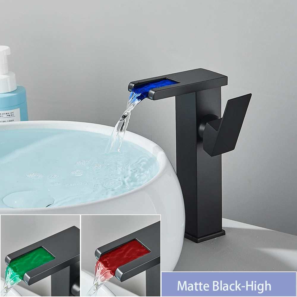Black LED bathroom sink faucet by MC THE BLACK DIAMOND, brass waterfall mixer with hot and cold water controls.