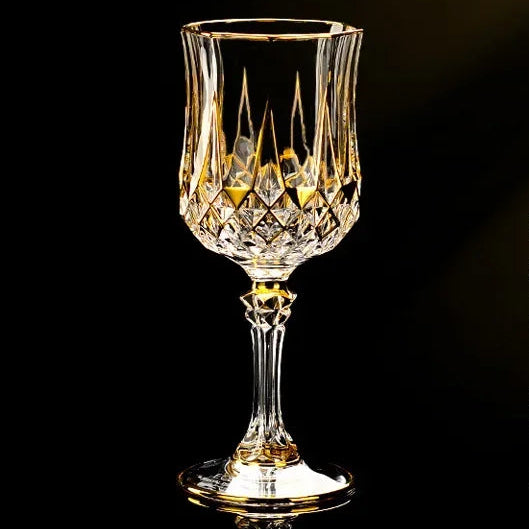 Elegant glass gold crystal red cup from MC THE BLACK DIAMOND drinkware set, showcasing a luxurious red and gold design.