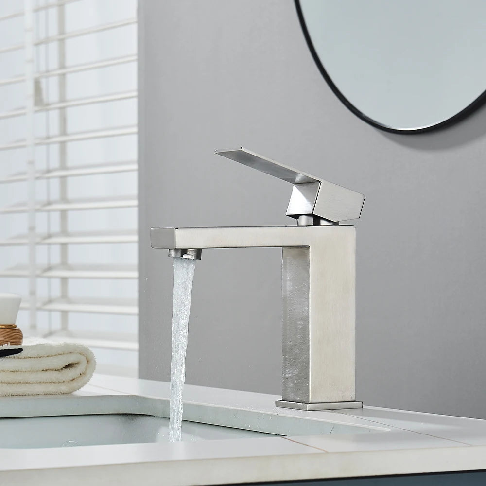 Matte black stainless steel bathroom sink faucet with hot and cold mixer from MC THE BLACK DIAMOND.