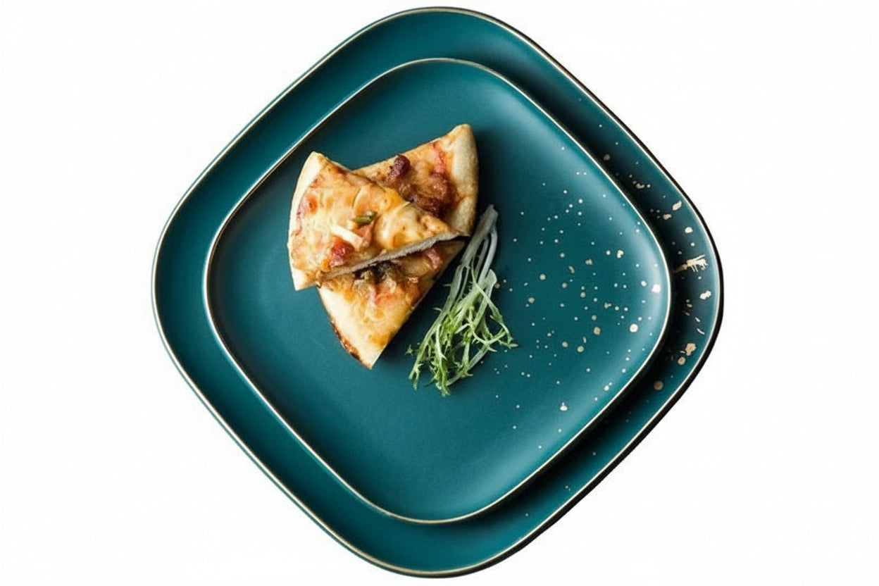 Dark green ceramic Western dinnerware set by MC THE BLACK DIAMOND, includes plates, bowls, and cups with a sleek, modern design.