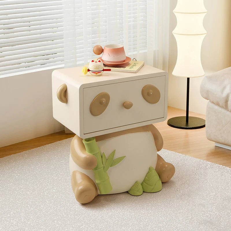 Cute panda-themed bedside table by MC THE BLACK DIAMOND, featuring creative floor storage and charming panda ornament design.