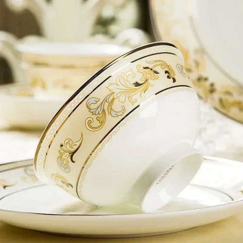 Golden ceramic dinnerware set by MC THE BLACK DIAMOND featuring elegant plates and bowls for luxury table settings.