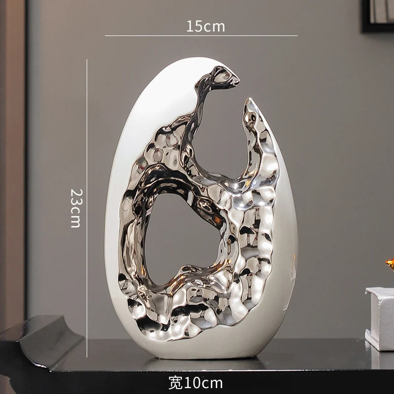 Gold MC THE BLACK DIAMOND figurines for living room or office decor, displayed on TV cabinet or desktop.