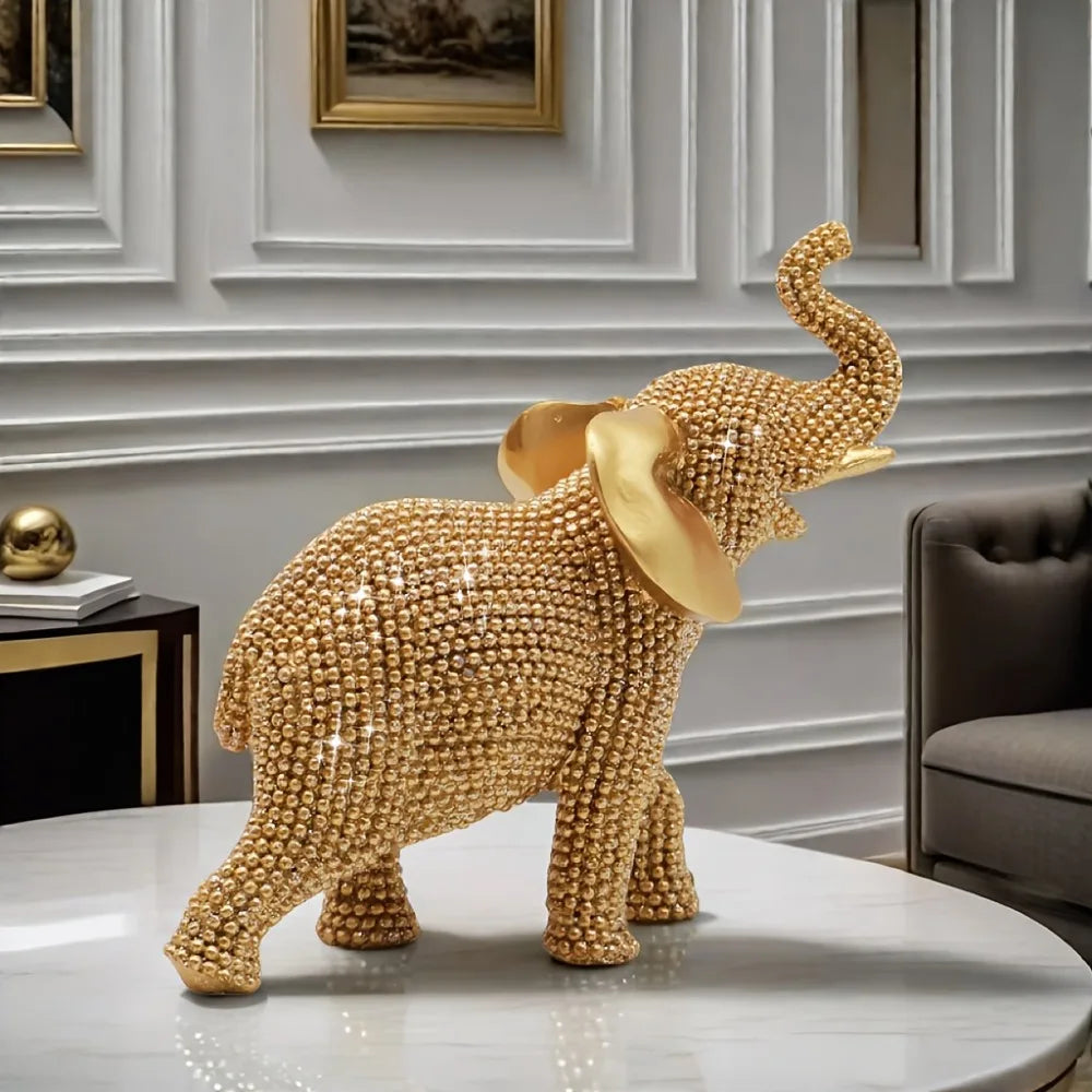 Golden elephant beaded figurine by MC THE BLACK DIAMOND, decorative home ornament for good luck and holiday decor.