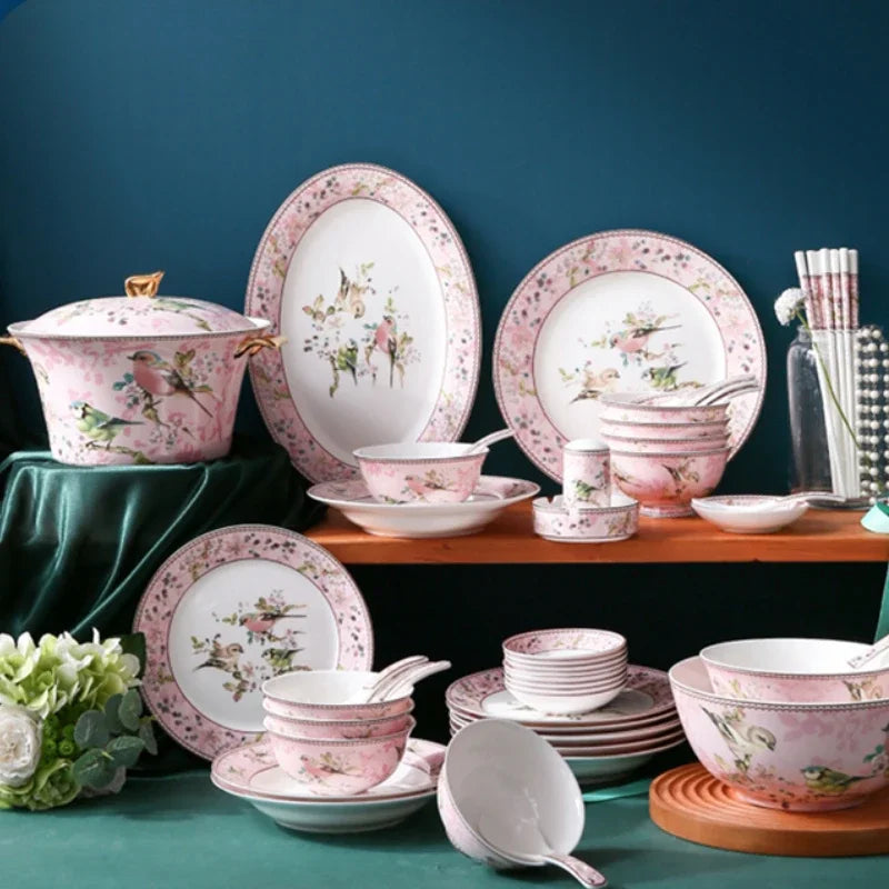 Luxury MC THE BLACK DIAMOND dinnerware set for family, featuring elegant plates, bowls, and serving dishes on a sleek table setting.