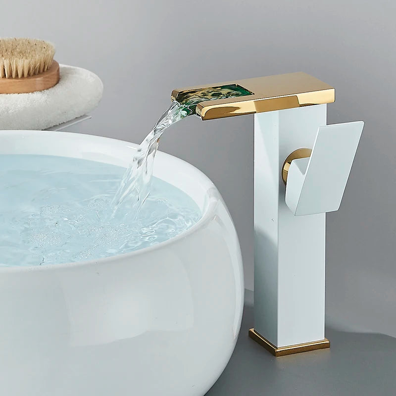 LED temperature-display basin faucet by MC THE BLACK DIAMOND, mounted on a bath sink, showing illuminated temperature indicator.