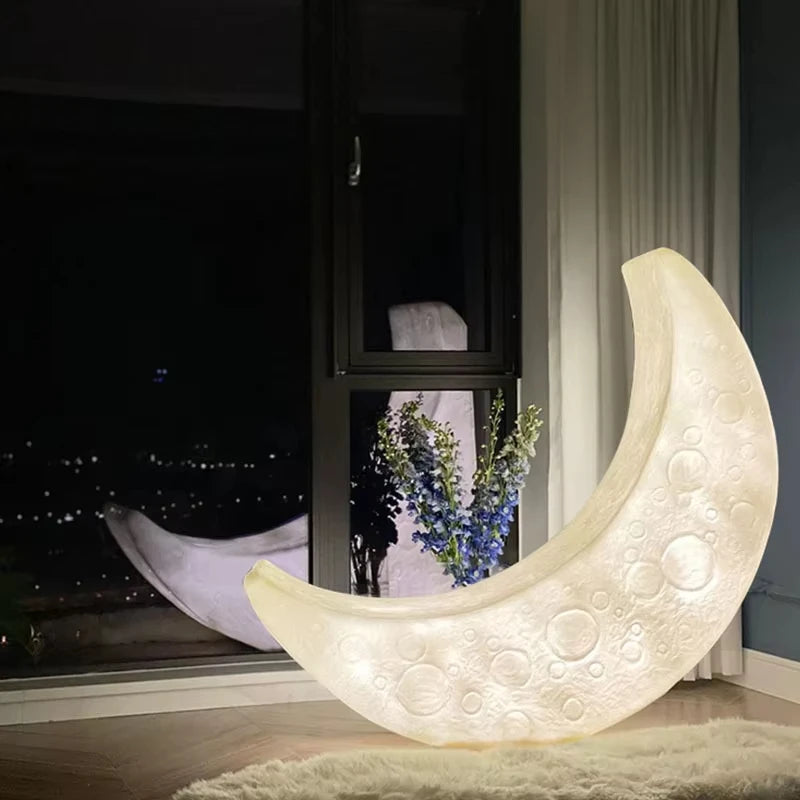 MC THE BLACK DIAMOND Moon Floor Lamp for home decor, featuring a modern design with a round, moon-shaped shade and sleek stand.