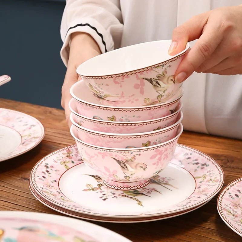 Luxury MC THE BLACK DIAMOND dinnerware set for family size, includes plates, bowls, and cups displayed on a dining table.